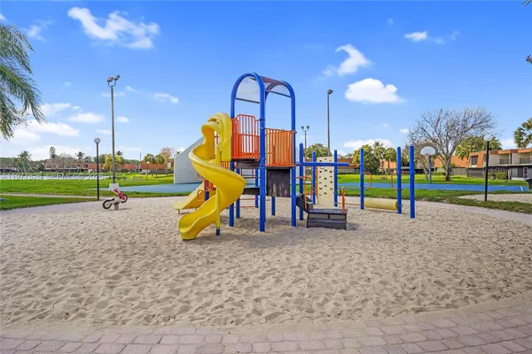 a view of park with swings
