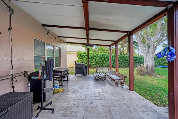 a view of swimming pool with a yard