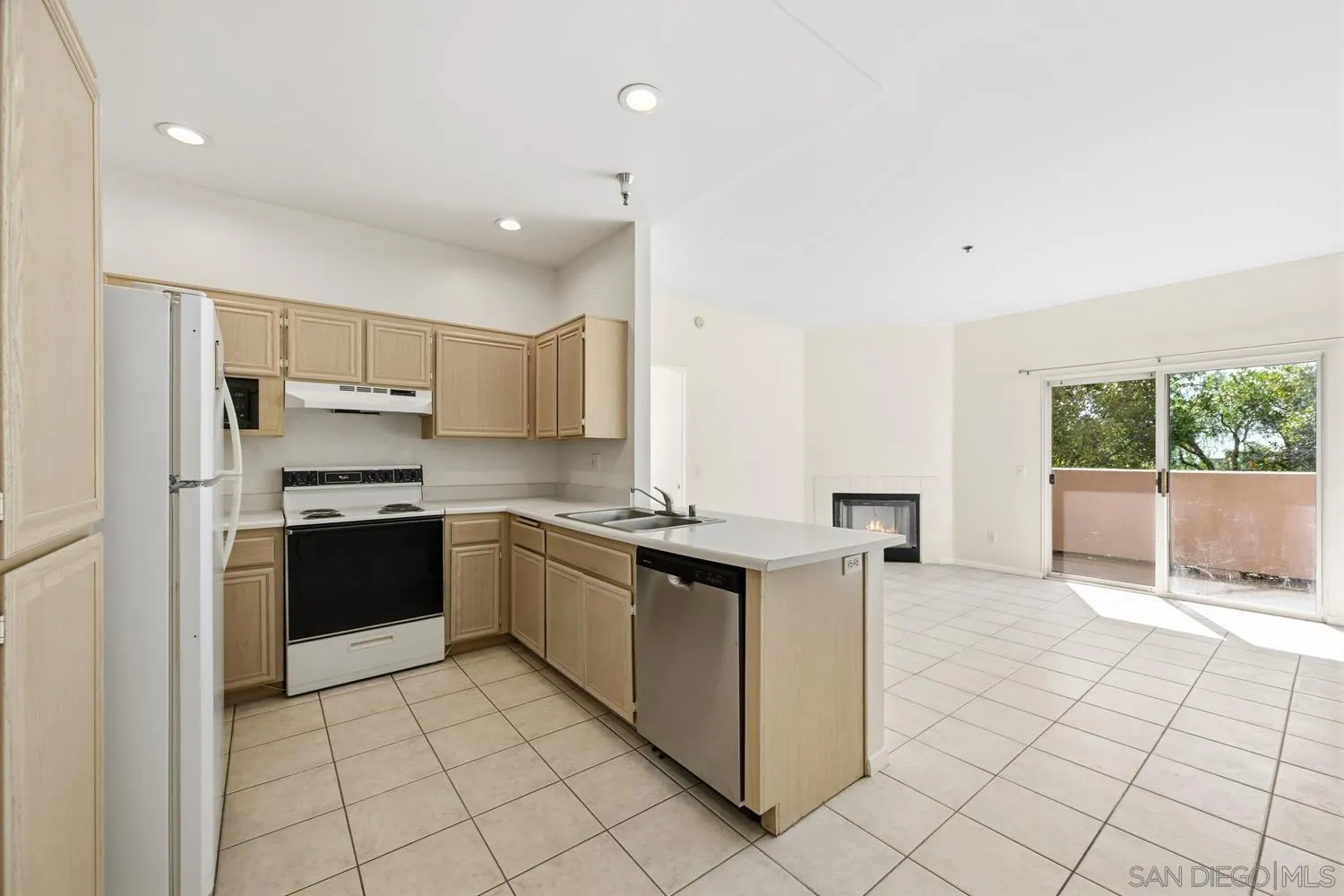 17161 Alva Road, Unit 2416 San Diego, CA 92127 - Photo 11 of 26 a kitchen with stainless steel appliances granite countertop a stove a sink and a refrigerator