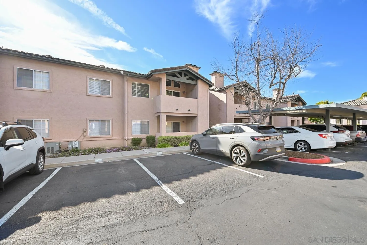 17161 Alva Road, Unit 2416 San Diego, CA 92127 - Photo 19 of 26 a view of a cars park in front of a house