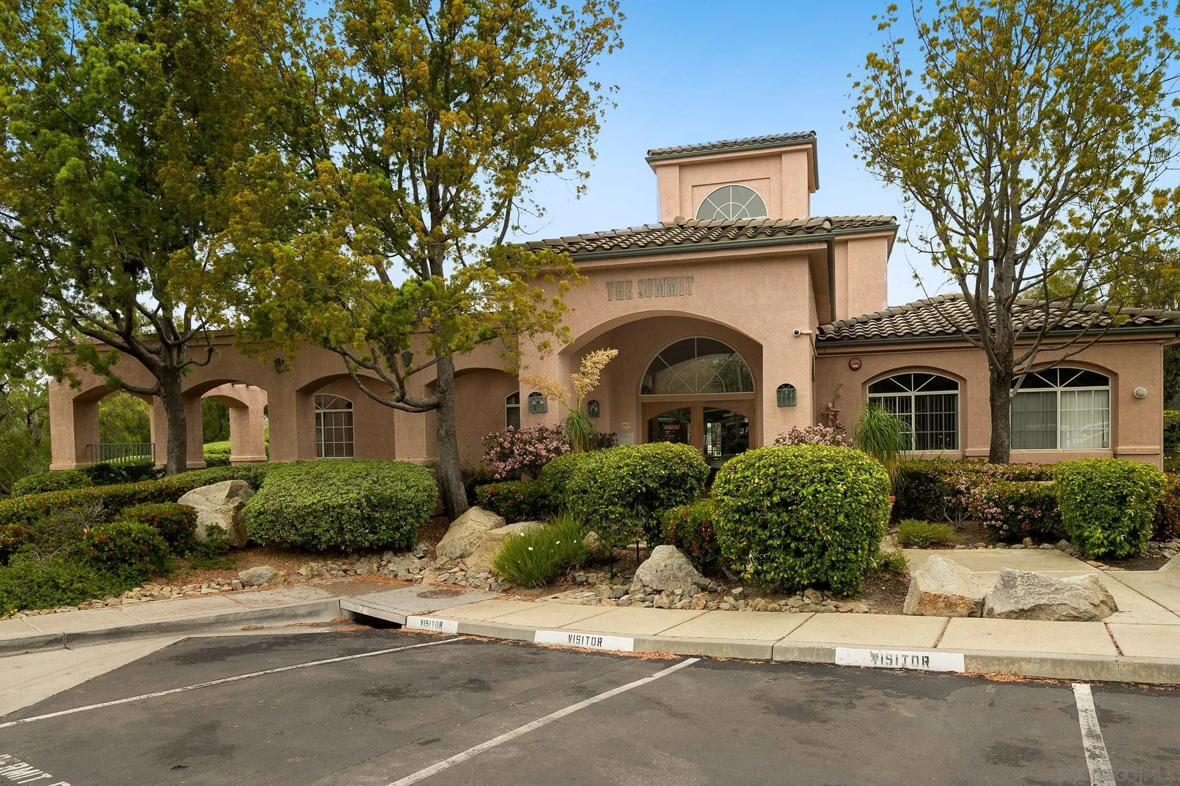 17161 Alva Road, Unit 2416 San Diego, CA 92127 - Photo 22 of 26 a front view of a house with a garden