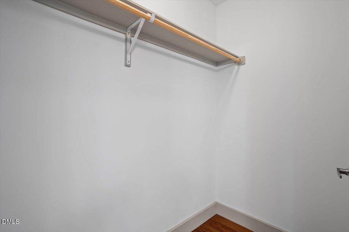 1300 St Marys Street, Unit 207 Raleigh, NC 27605 - Photo 14 of 31 a view of small space with racks on the wall