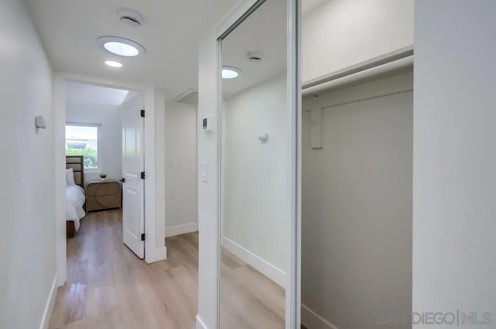175 Bronze Way Vista, CA 92083 - Photo 12 of 33 a view of a bathroom with a sink and a mirror