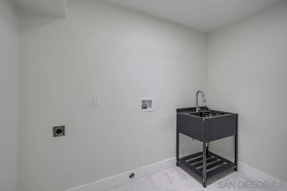 175 Bronze Way Vista, CA 92083 - Photo 16 of 33 a room with a table and a window