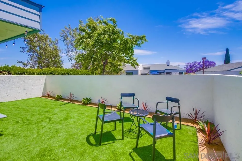 175 Bronze Way Vista, CA 92083 - Photo 30 of 33 a view of yard with seating area and trees in the background
