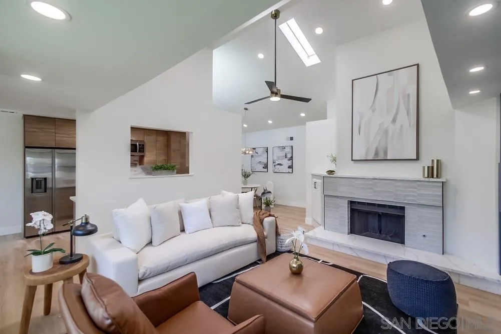 175 Bronze Way Vista, CA 92083 - Photo 4 of 33 a living room with furniture and a fireplace