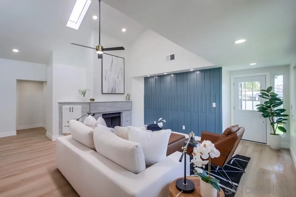 175 Bronze Way Vista, CA 92083 - Photo 8 of 33 a living room with furniture a fireplace and a potted plant