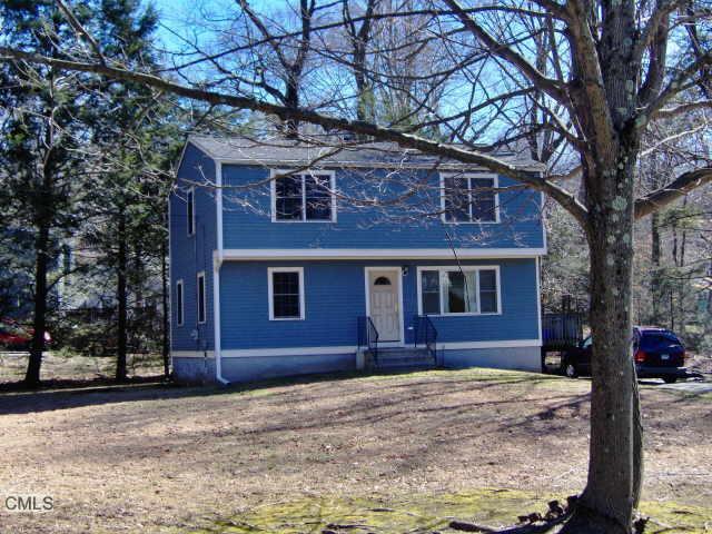 120 Nonopoge Road Fairfield, CT 06825 - Photo 1 of 1 a front view of a house with a yard