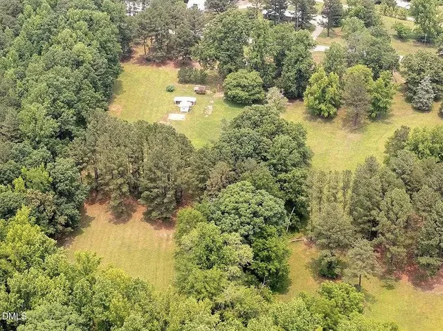 a view of a lake with a yard