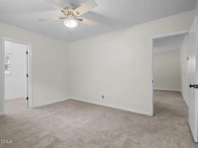 a kitchen with cabinets appliances and a counter space