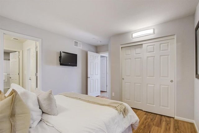 a bathroom with a shower and a toilet