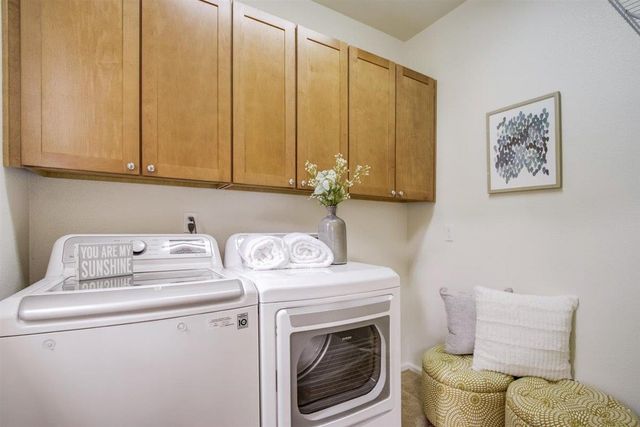 an aerial view of a house with a lake view