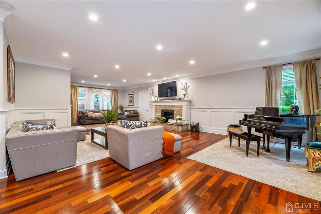 47 Agate Road East Brunswick, NJ 08816 - Photo 14 of 47 a living room with fireplace furniture and a wooden floor