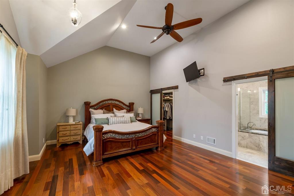 47 Agate Road East Brunswick, NJ 08816 - Photo 17 of 47 a bedroom with a bed and a ceiling fan