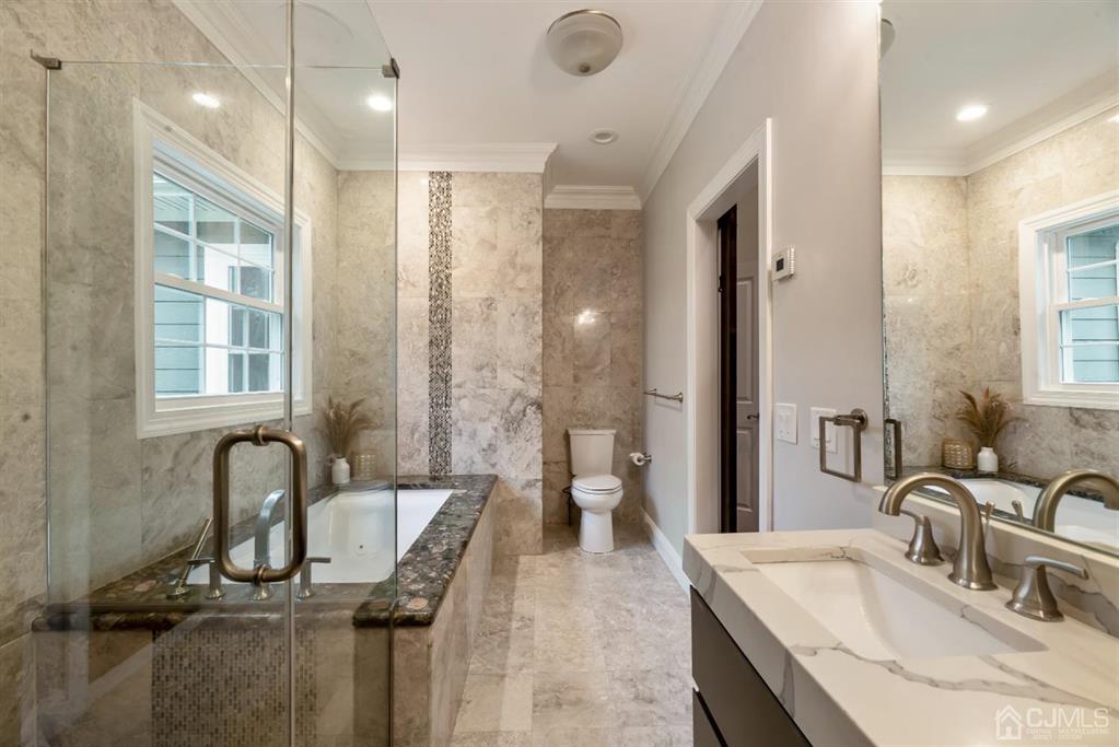 47 Agate Road East Brunswick, NJ 08816 - Photo 19 of 47 a bathroom with a granite countertop sink mirror and bathtub