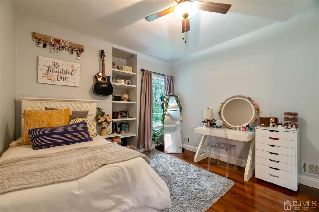 47 Agate Road East Brunswick, NJ 08816 - Photo 20 of 47 a bedroom with a bed and a dresser