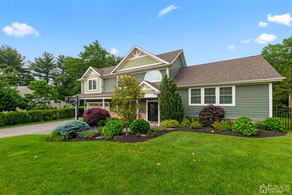 47 Agate Road East Brunswick, NJ 08816 - Photo 2 of 47 a front view of house with yard and green space