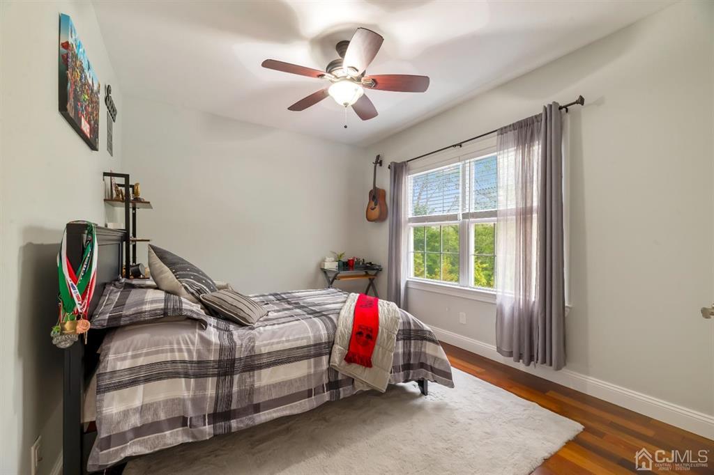 47 Agate Road East Brunswick, NJ 08816 - Photo 23 of 47 a bedroom with bed and a window