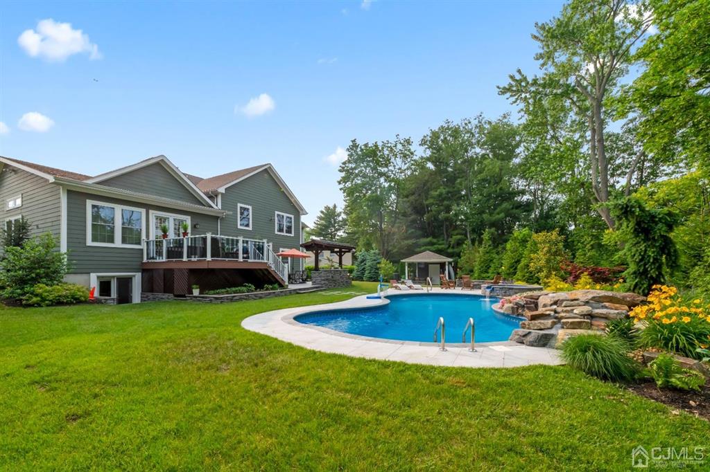 47 Agate Road East Brunswick, NJ 08816 - Photo 31 of 47 a view of a house with swimming pool and sitting area