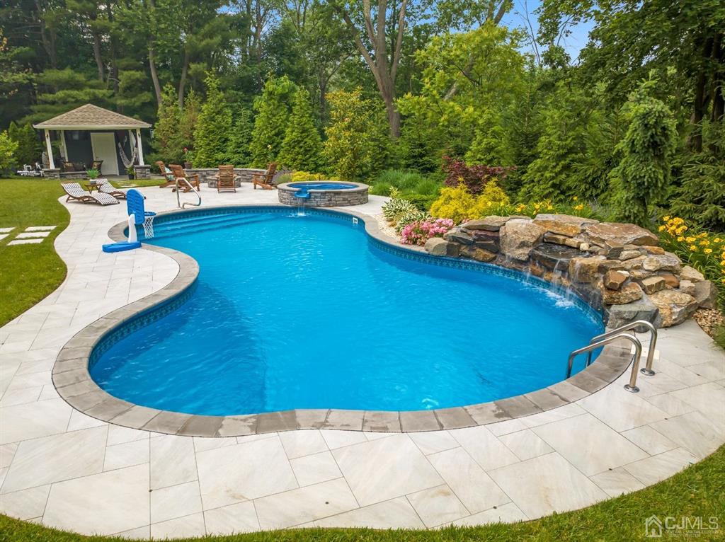 47 Agate Road East Brunswick, NJ 08816 - Photo 32 of 47 a view of a swimming pool with a yard