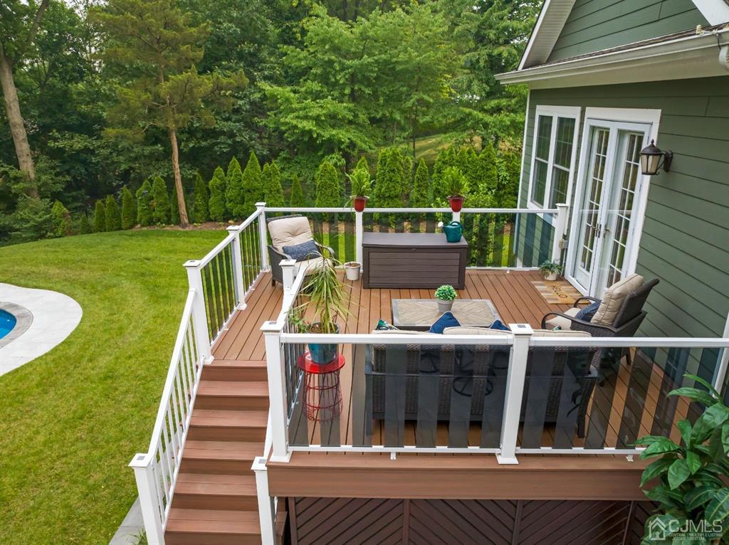47 Agate Road East Brunswick, NJ 08816 - Photo 37 of 47 a view of a deck with two chair and table