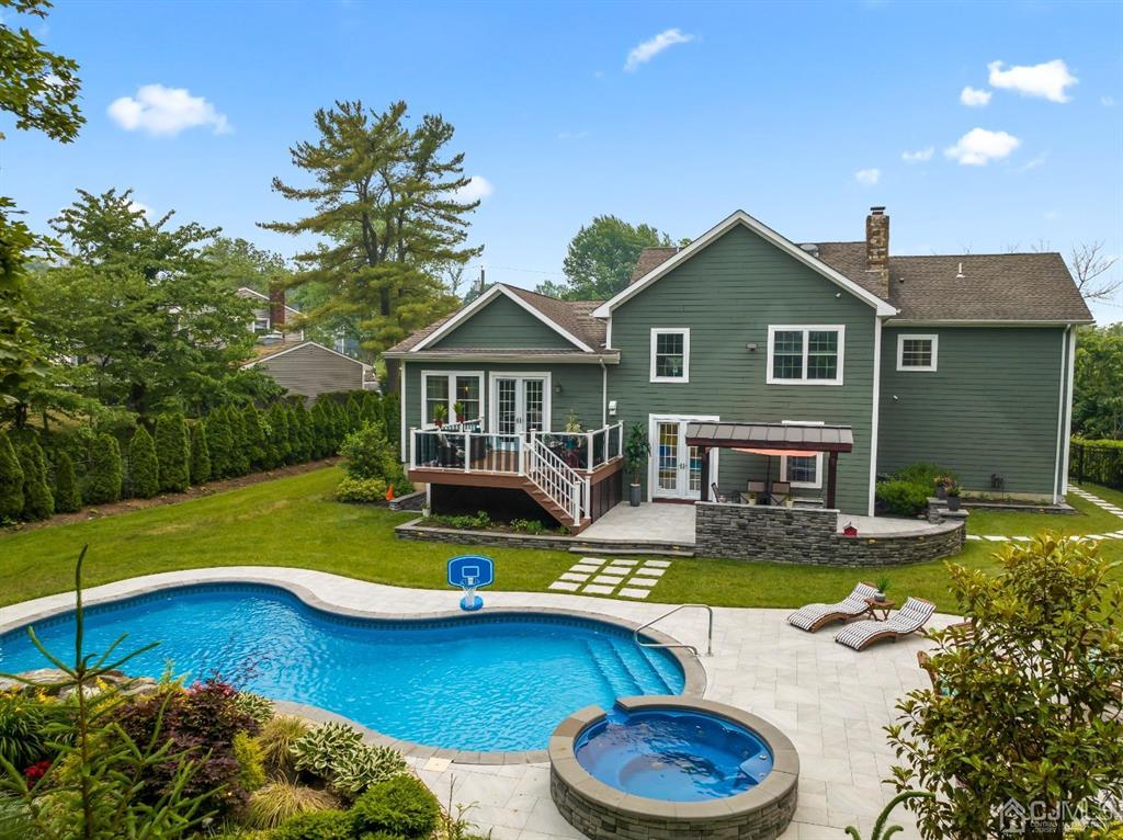 47 Agate Road East Brunswick, NJ 08816 - Photo 39 of 47 a view of a house with swimming pool and porch with furniture