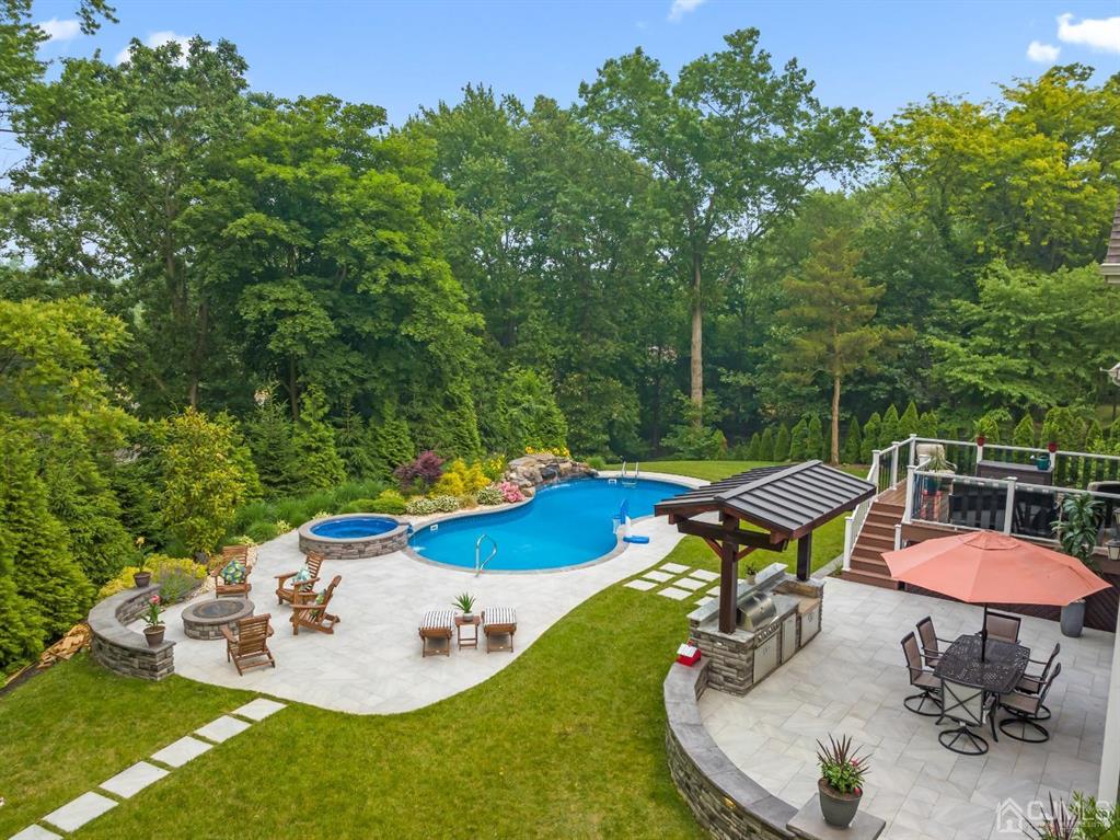 47 Agate Road East Brunswick, NJ 08816 - Photo 40 of 47 a view of a chairs and table in backyard