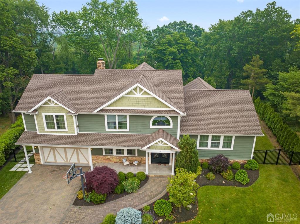 47 Agate Road East Brunswick, NJ 08816 - Photo 42 of 47 front view of a house with a yard