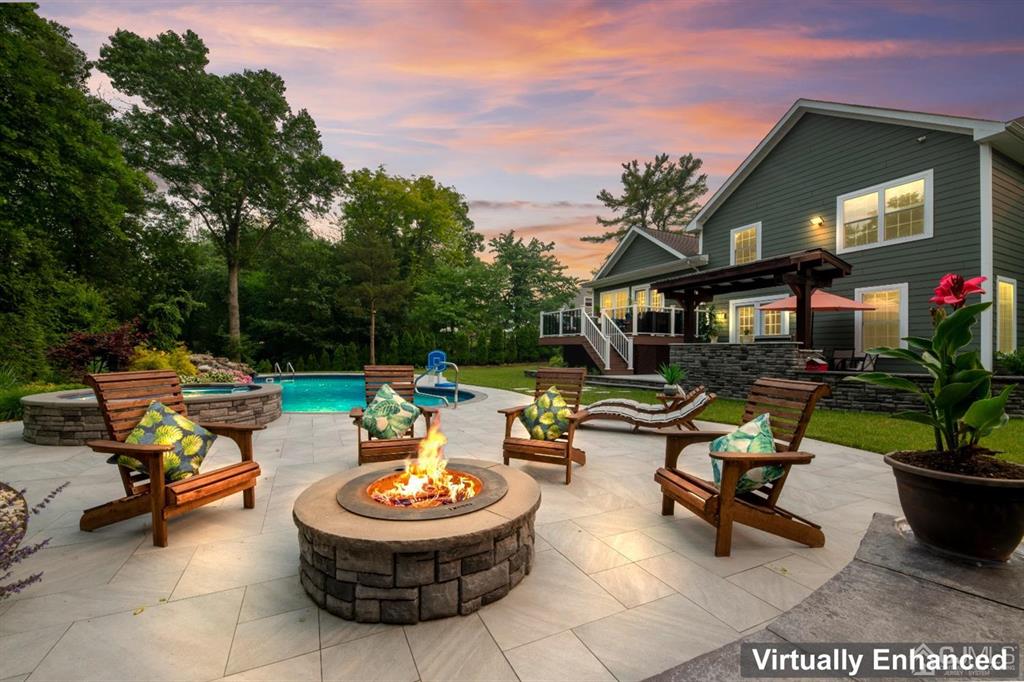 47 Agate Road East Brunswick, NJ 08816 - Photo 47 of 47 a view of a backyard with swimming pool and sitting area