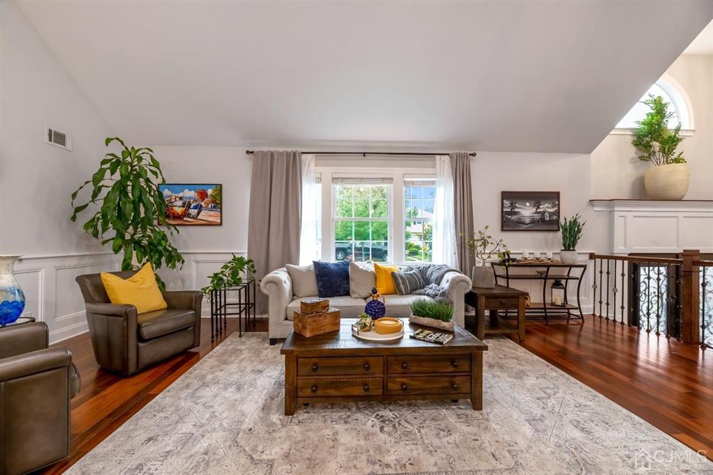47 Agate Road East Brunswick, NJ 08816 - Photo 5 of 47 a living room with furniture fireplace and potted plants