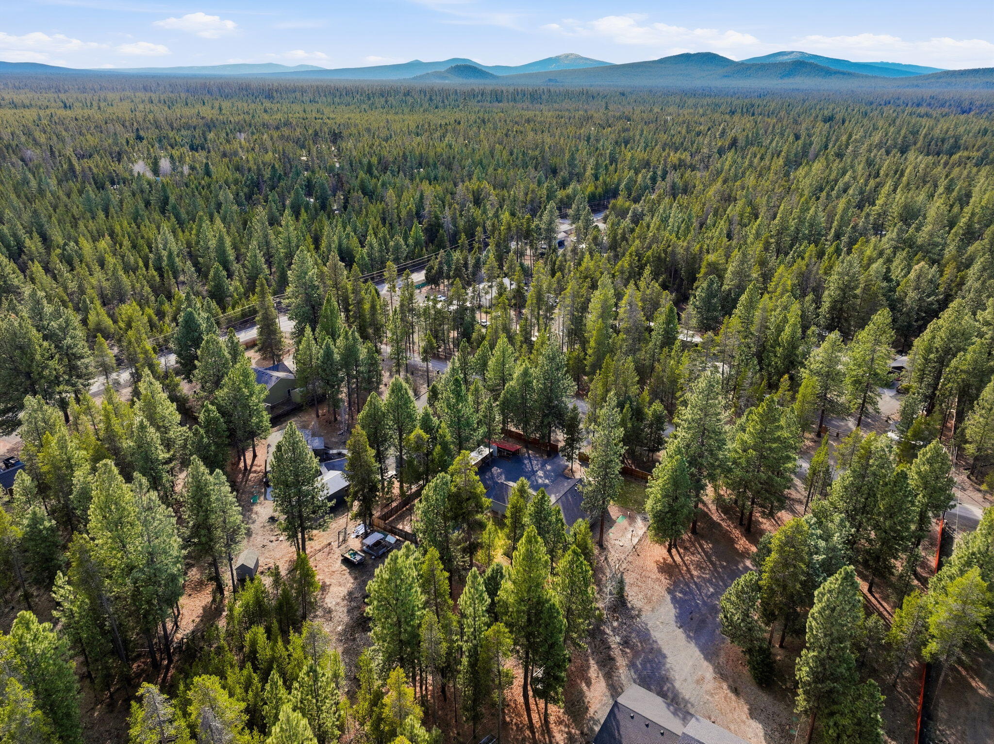 51432 Jory Road La Pine, OR 97739 - Photo 44 of 51 a view of a lush green outdoor space with a lake and mountain view