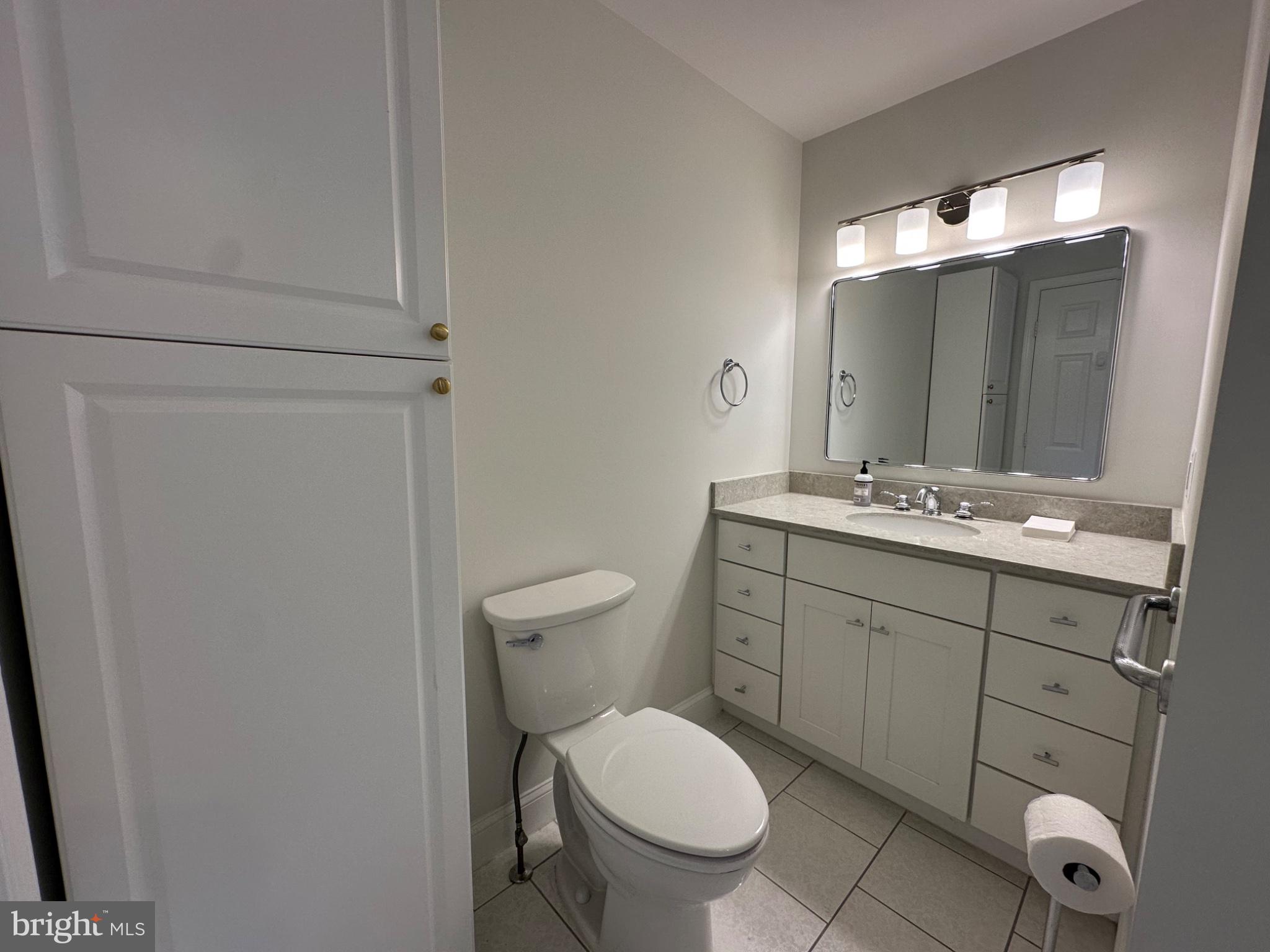 14616 Sturtevant Road Silver Spring, MD 20905 - Photo 19 of 44 Bathroom 2-Sleek and modern bathroom retreat.