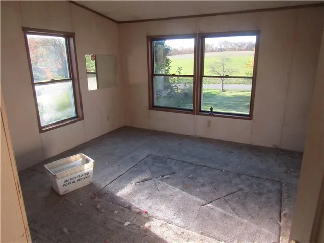 an empty room with windows