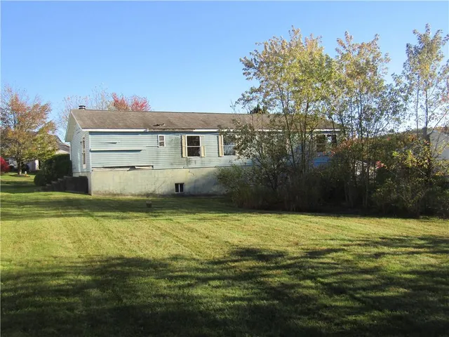 a view of a house with a swimming pool