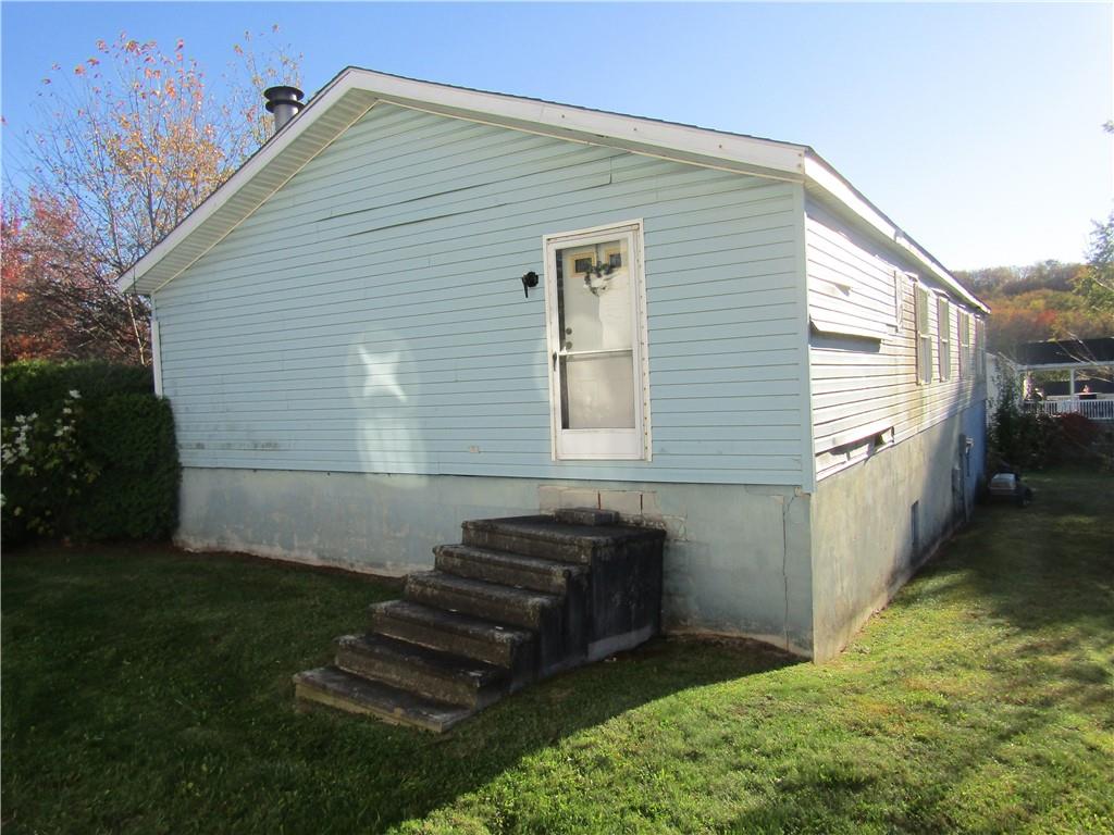 123 Stern Street Friedens, PA 15541 - Photo 6 of 16 a view of a backyard with sitting area