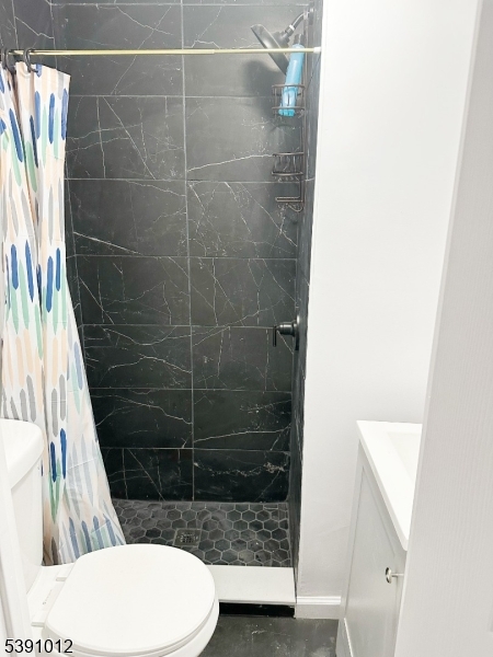 26 Duryea Street Newark, NJ 07103 - Photo 12 of 15 a bathroom with a toilet and a shower