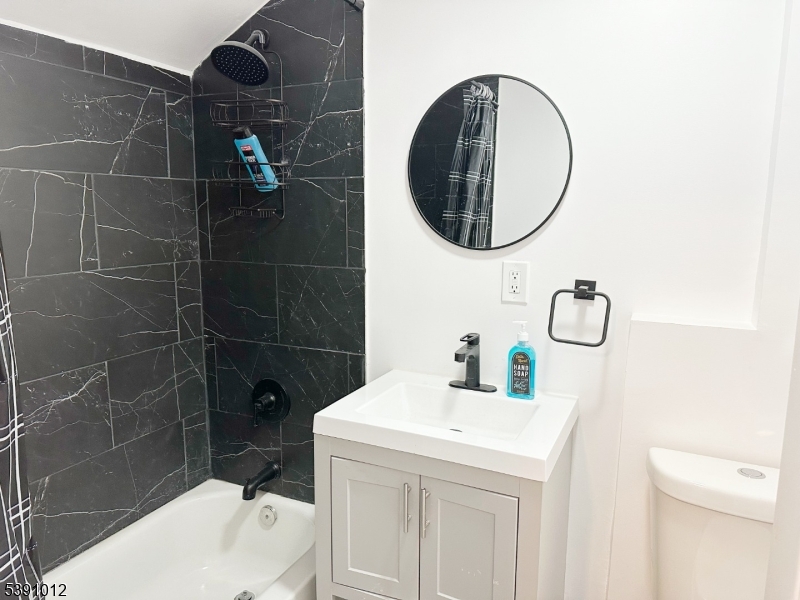 26 Duryea Street Newark, NJ 07103 - Photo 13 of 15 a bathroom with a sink toilet and shower