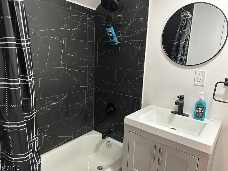 26 Duryea Street Newark, NJ 07103 - Photo 3 of 15 a bathroom with a sink toilet and shower