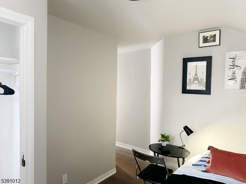 26 Duryea Street Newark, NJ 07103 - Photo 10 of 15 a living room with furniture and wooden floor