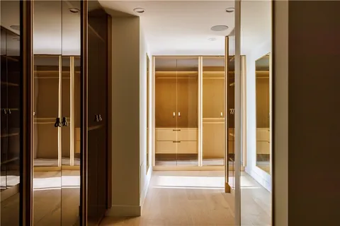 a bathroom with a glass shower door
