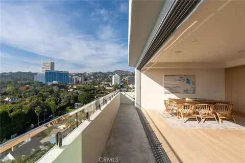 a view of balcony with furniture