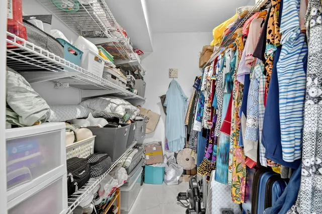 an aerial view of residential houses with outdoor space and street view