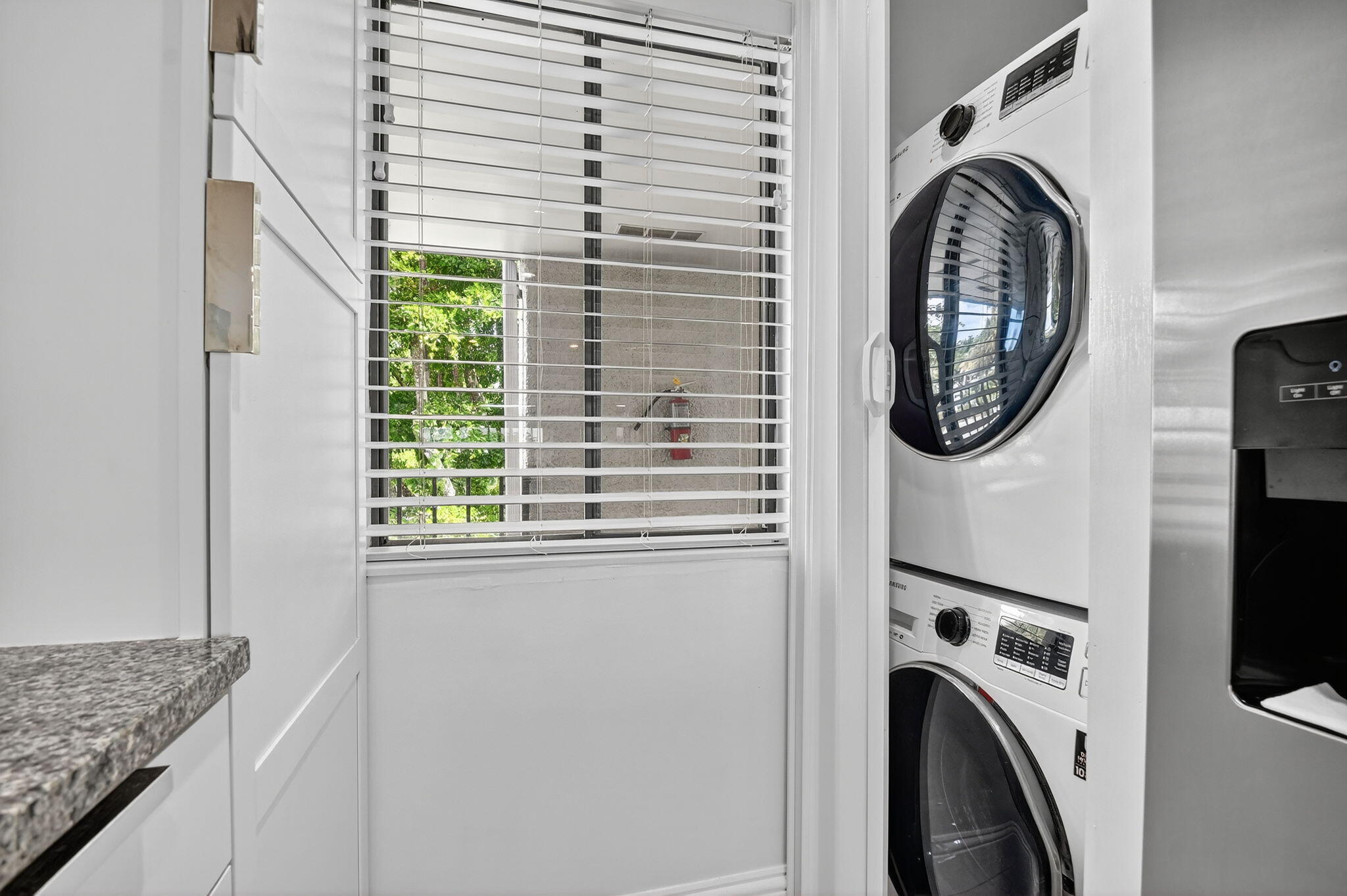 4381 Trevi Court, Unit 303 Lake Worth, FL 33467 - Photo 31 of 80 a utility room with dryer and washer