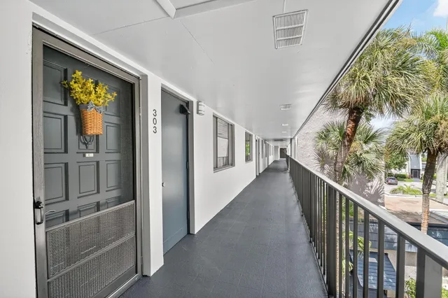 a kitchen with a sink and a refrigerator