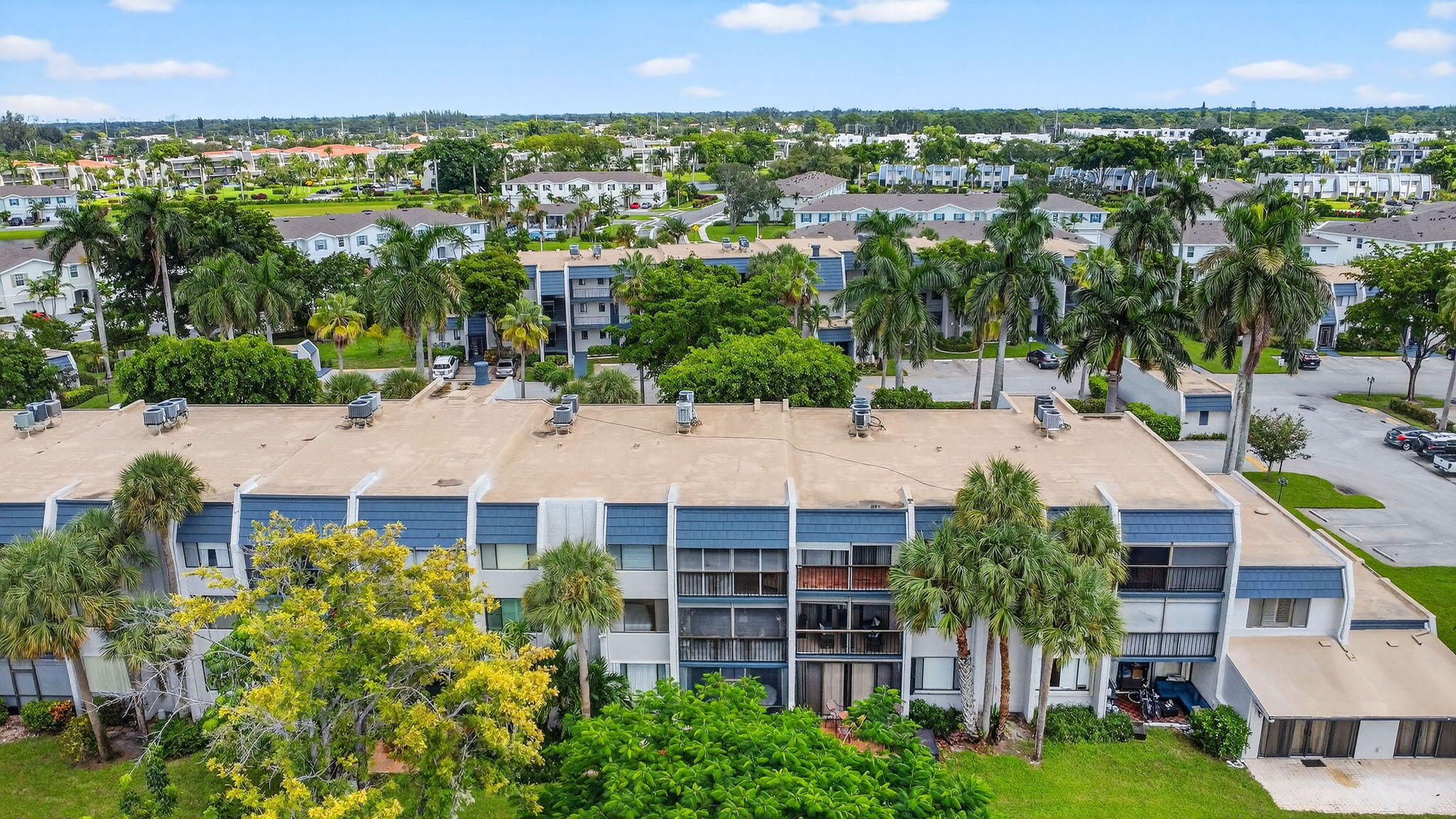 4381 Trevi Court, Unit 303 Lake Worth, FL 33467 - Photo 42 of 80 an aerial view of multiple house