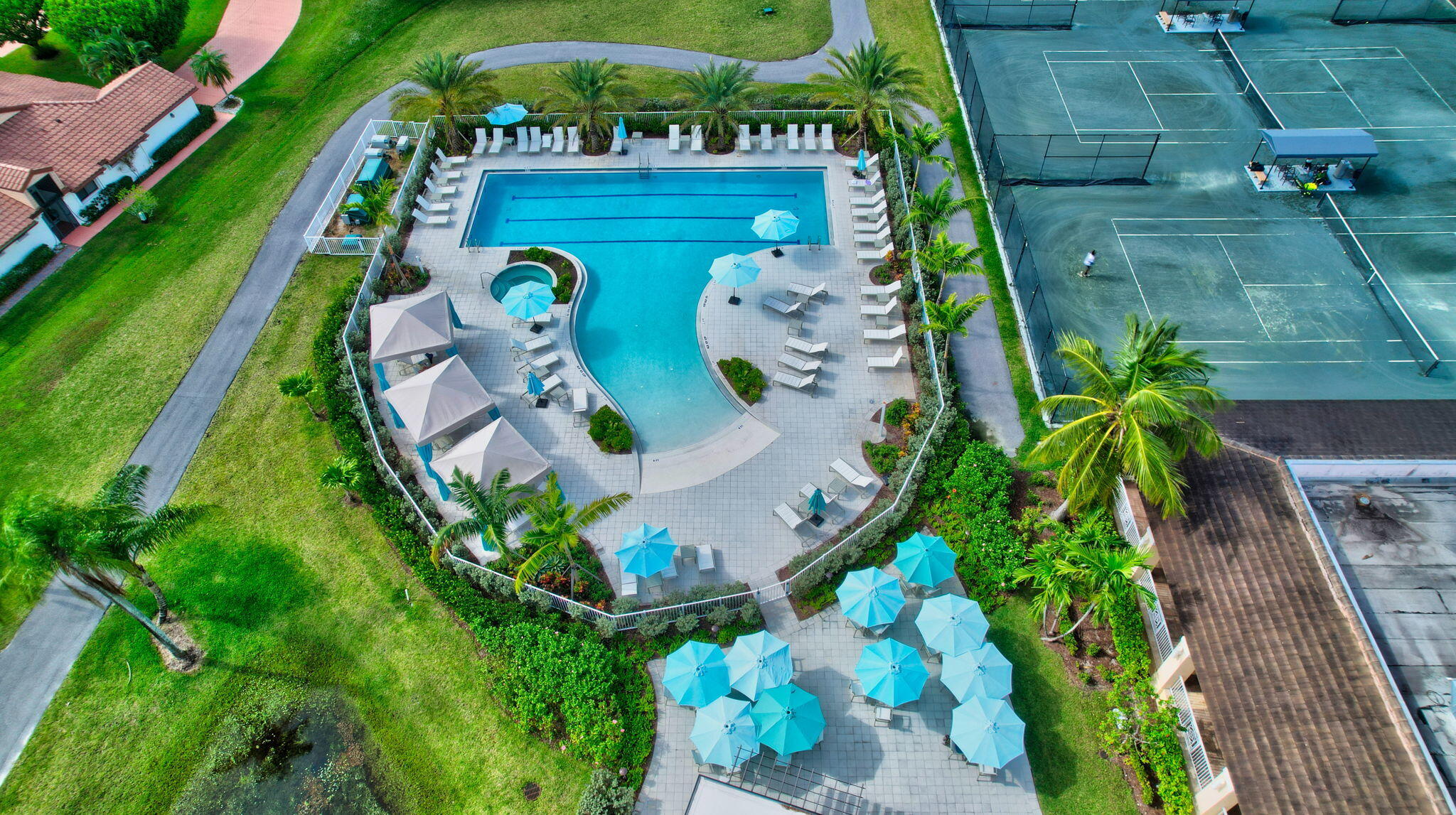 4381 Trevi Court, Unit 303 Lake Worth, FL 33467 - Photo 65 of 80 a bird view of multi story residential apartment building with yard