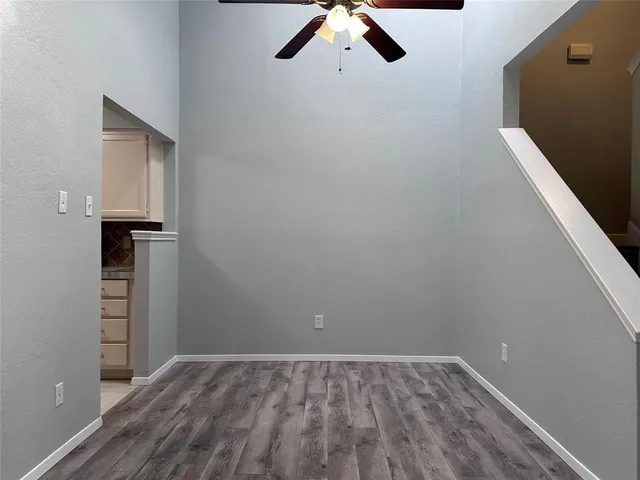 a view of empty room with closet