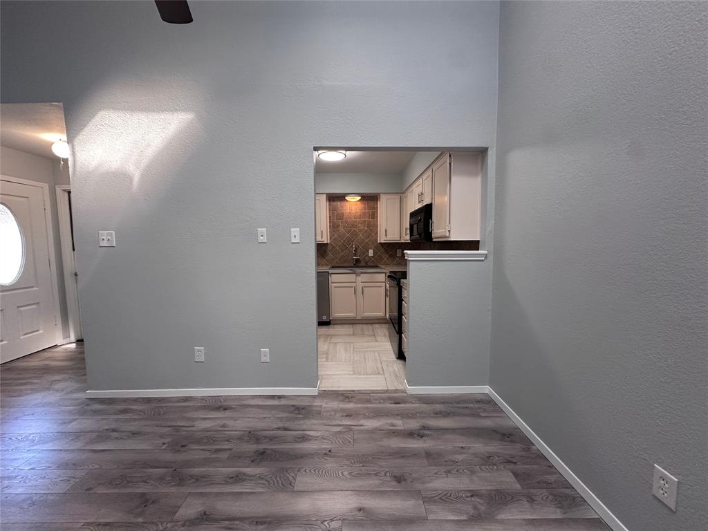 116 Main Place Euless, TX 76040 - Photo 12 of 31 a view of a kitchen from the hallway