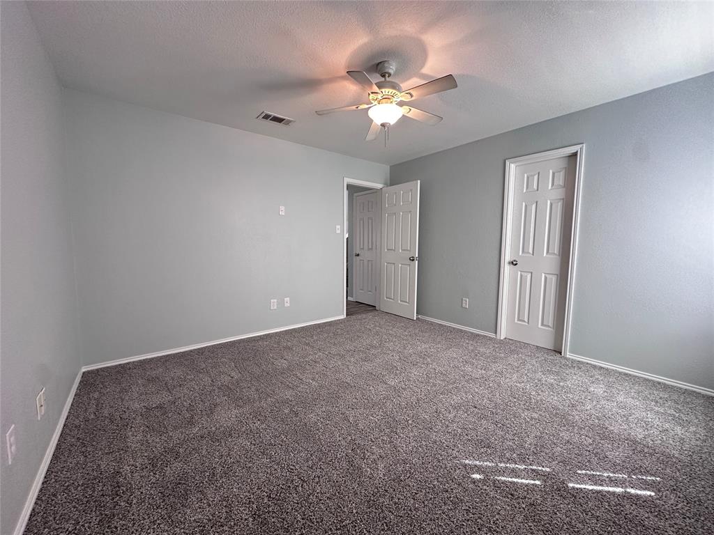 116 Main Place Euless, TX 76040 - Photo 17 of 31 a view of an empty room with chandelier fan