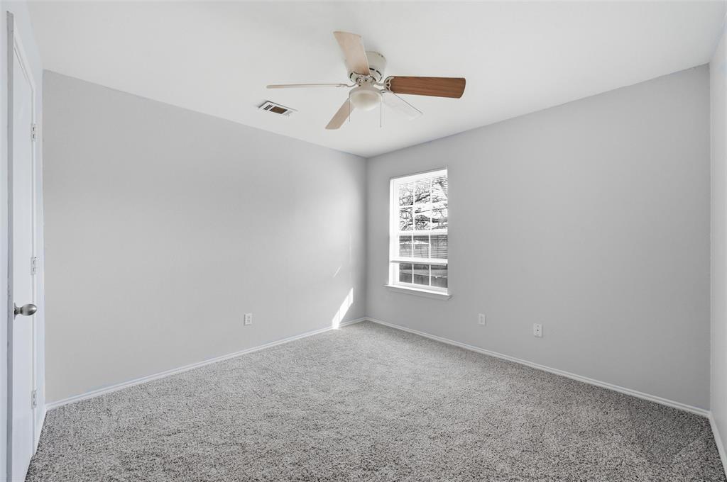 116 Main Place Euless, TX 76040 - Photo 17 of 31 a view of an empty room with a window